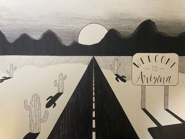 Drawing of road, cacti and sign welcome to Arizona